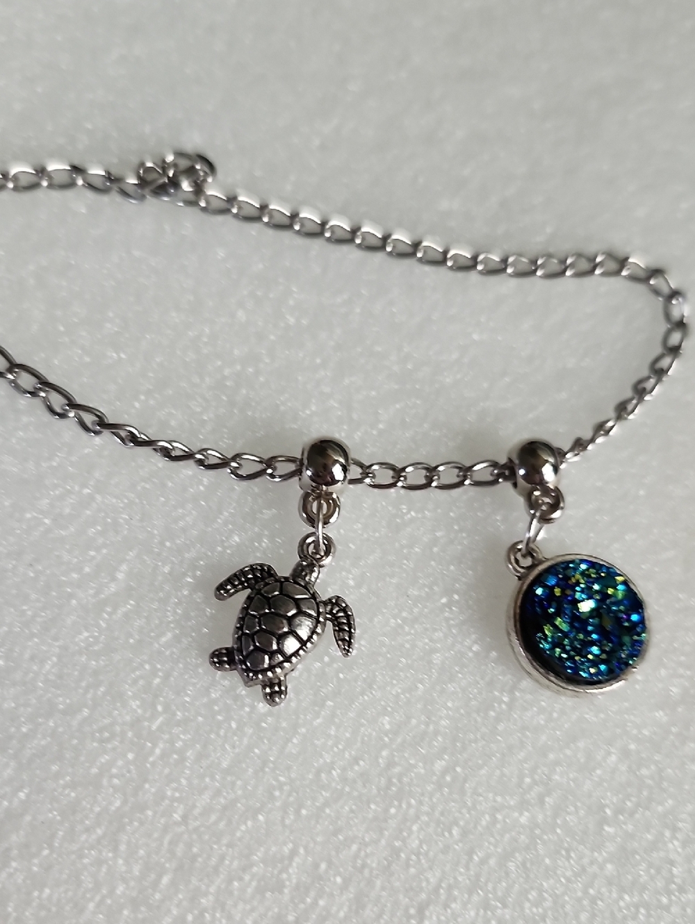Hand Crafted Silver Turtle Charm Bracelet with Blue-Green Druzy Accent